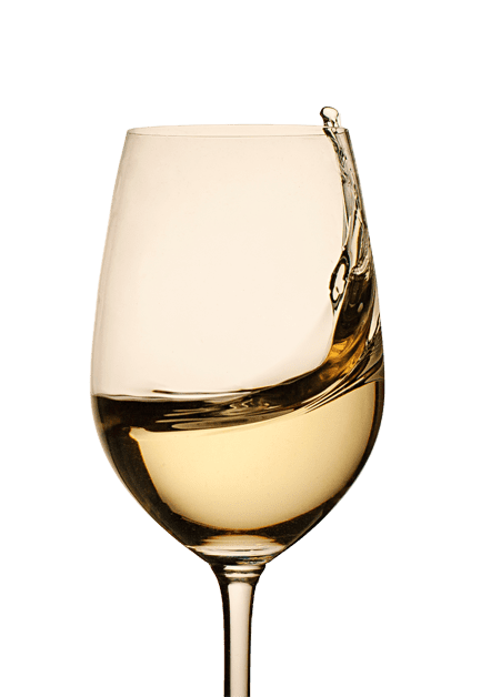 A glass white wine with a splash near the rim, against a green background.