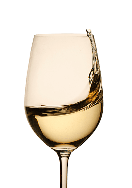 A glass white wine with a splash near the rim, against a green background.