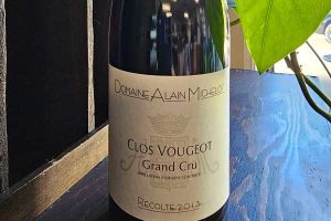 A bottle of Domaine Alain Michelot Clos Vougeot Grand Cru, vintage 2013