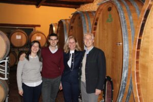 A family stands together in the Colutta cellar.