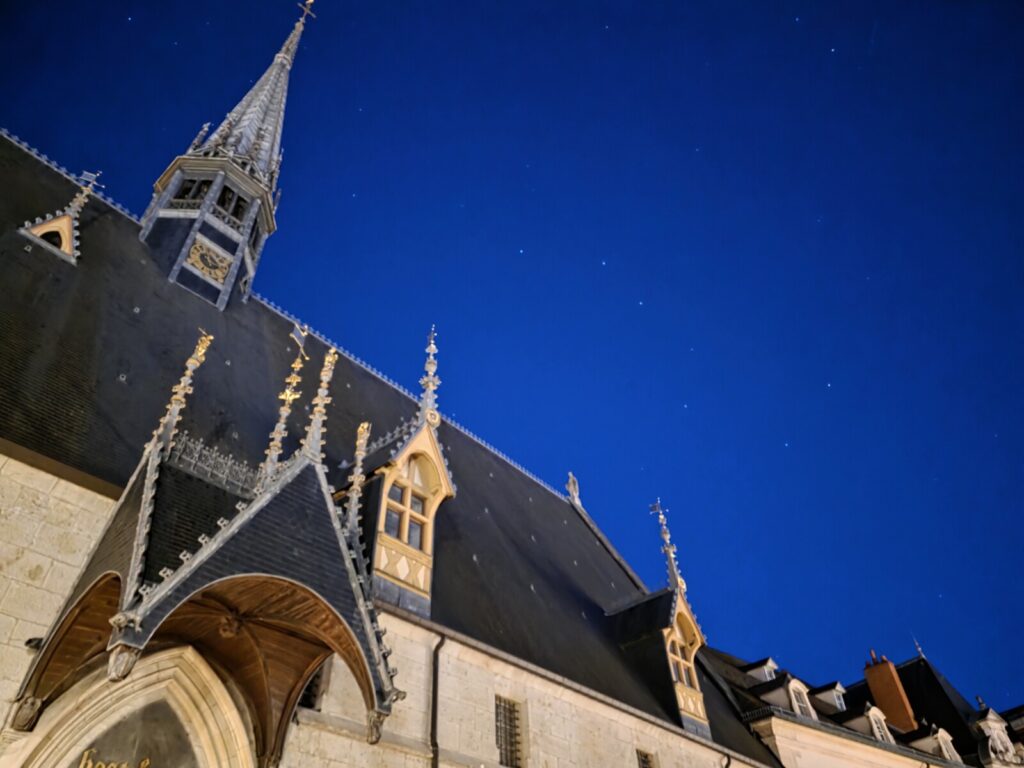 The big dipper constellation is seen in the night sky above a French building.