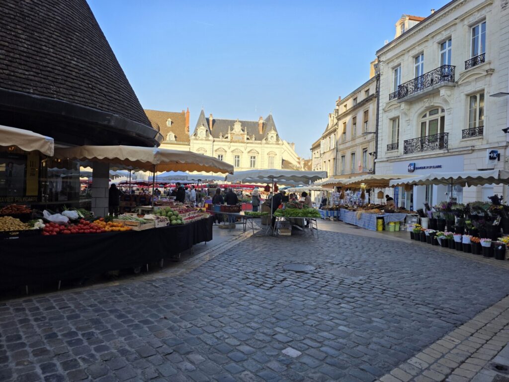 An outdoor market on a French street.