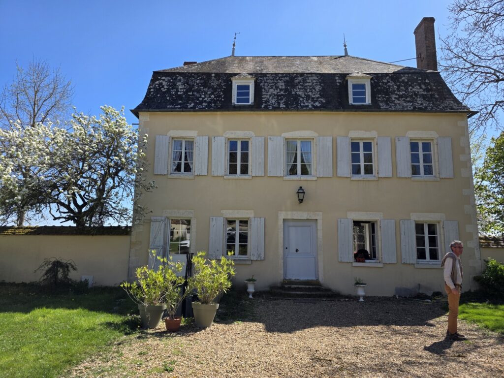 A historic house on a sunny day.