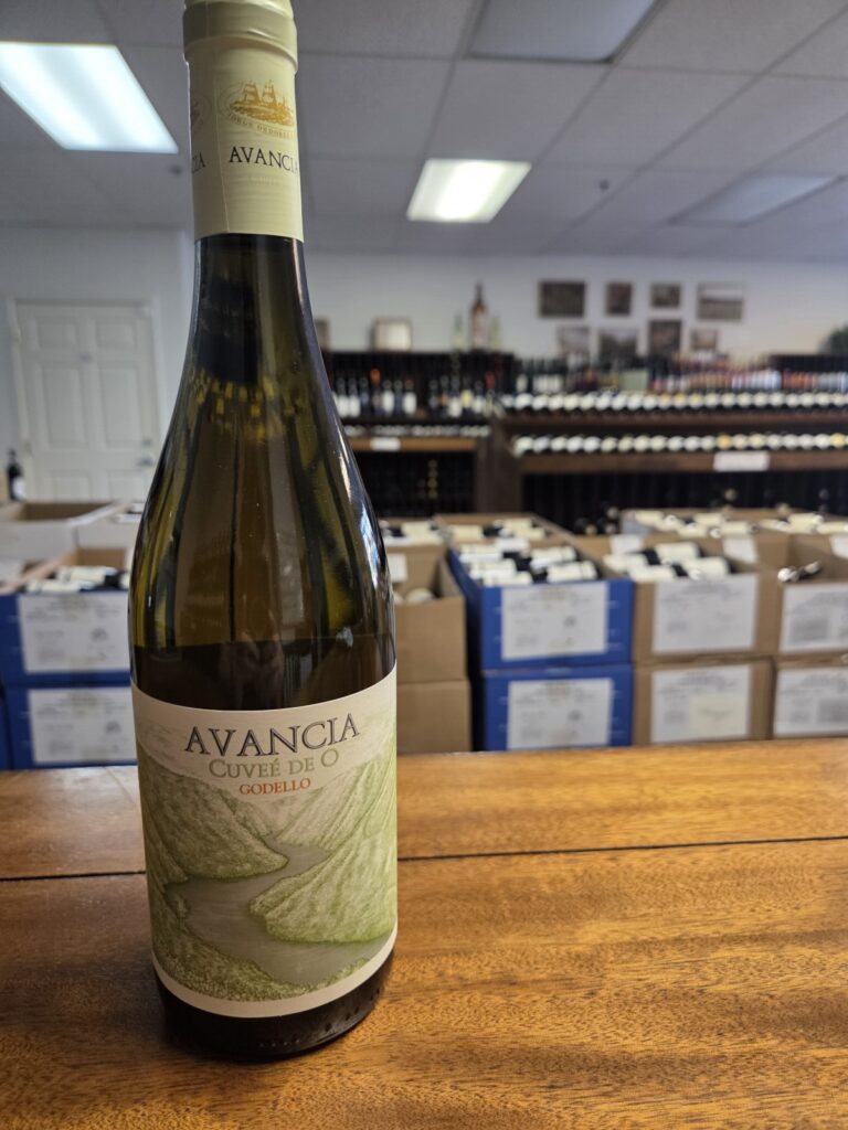 A wine bottle on a counter inside University Wines.
