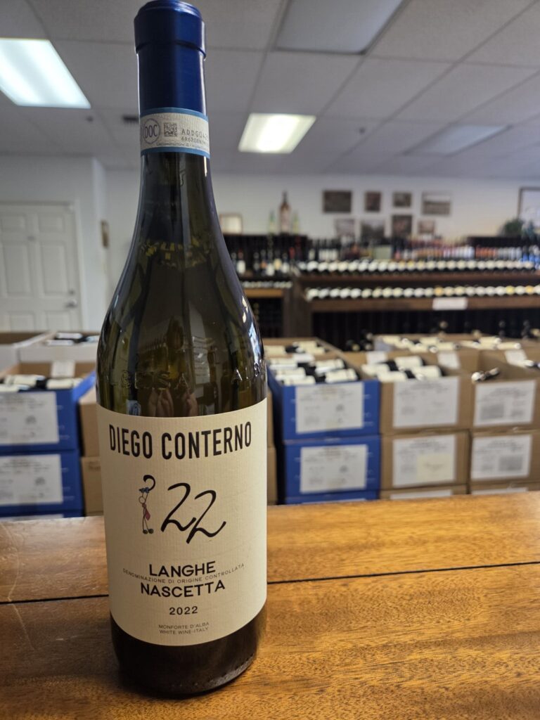 A wine bottle on a counter inside University Wines.