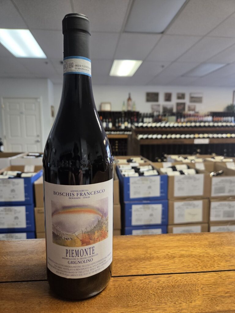 A wine bottle on a counter inside University Wines.