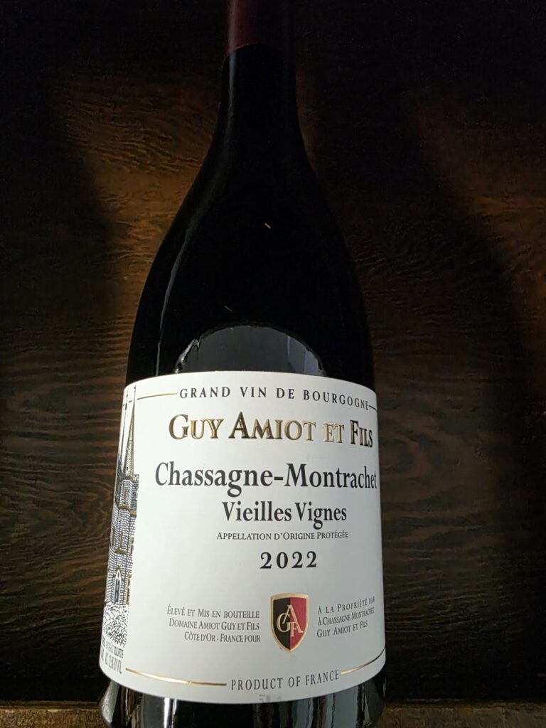 A bottle of Domaine Guy Amiot Chassagne-Montrachet Rouge Vieilles Vignes 2022.