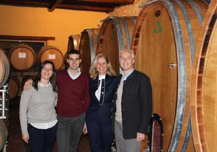 A family stands together in the Colutta cellar.