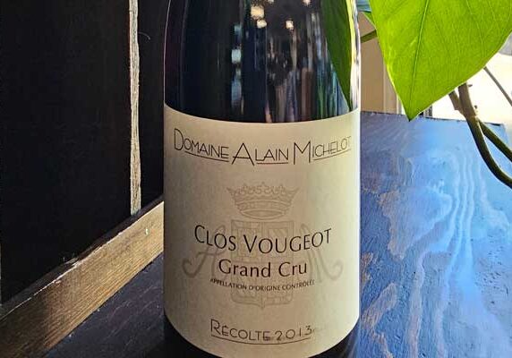 A bottle of Domaine Alain Michelot Clos Vougeot Grand Cru, vintage 2013